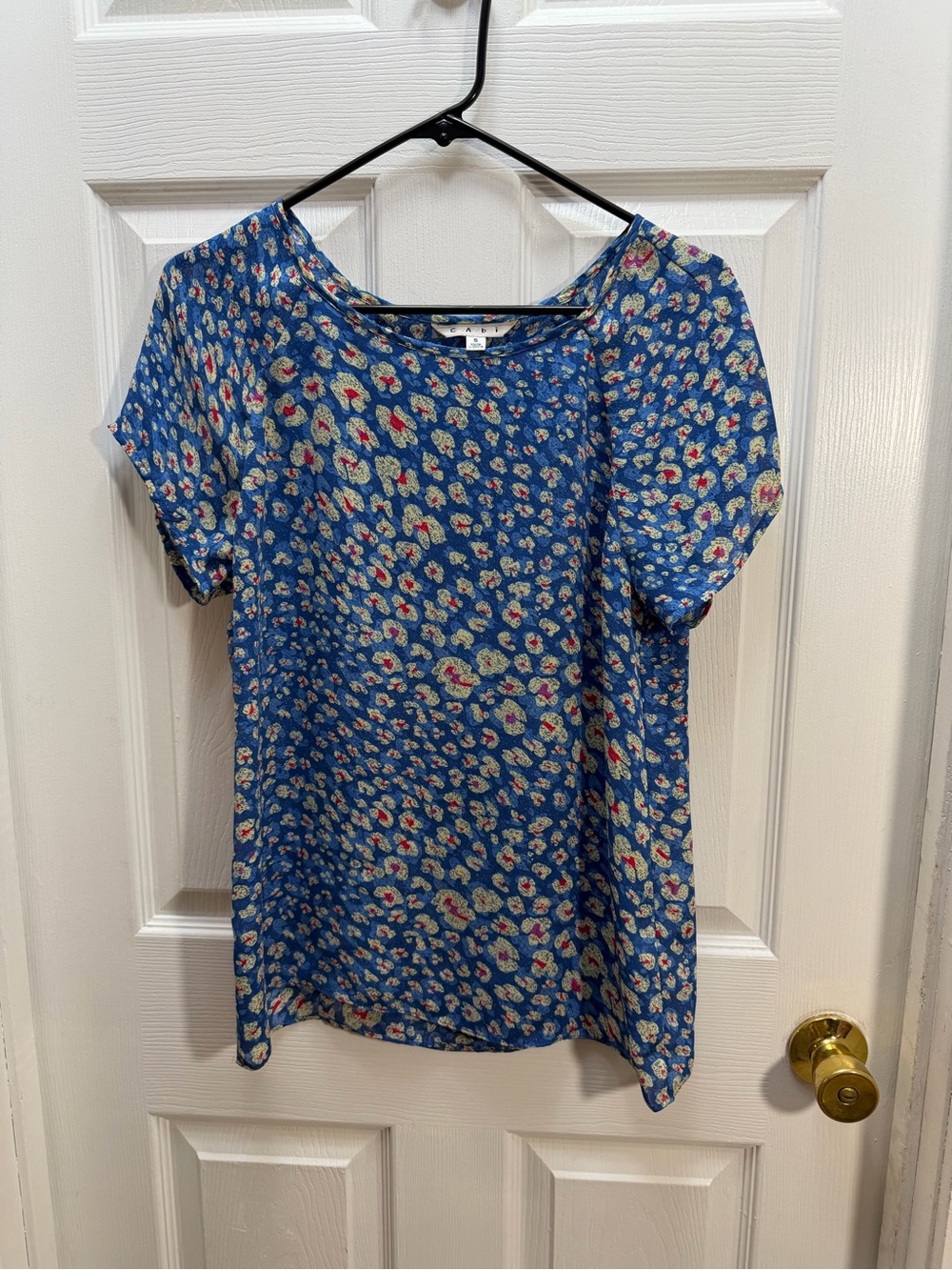 CAbi Blue Floral Short Sleeve Top with Cream and Red Accents